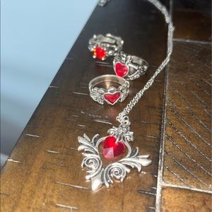 red gem necklaces and rings